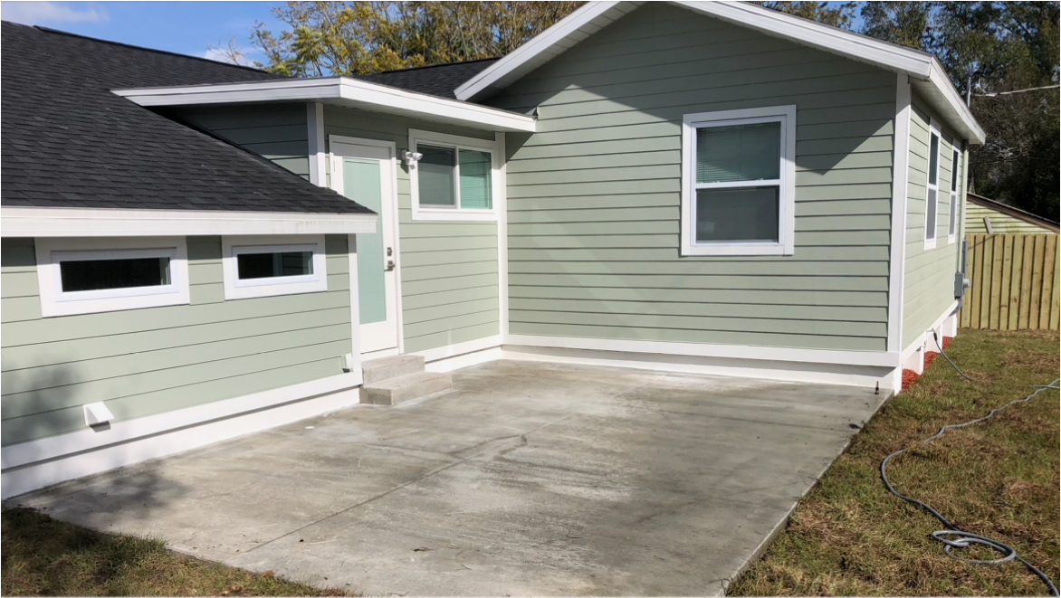 House 1 — rear & patio after