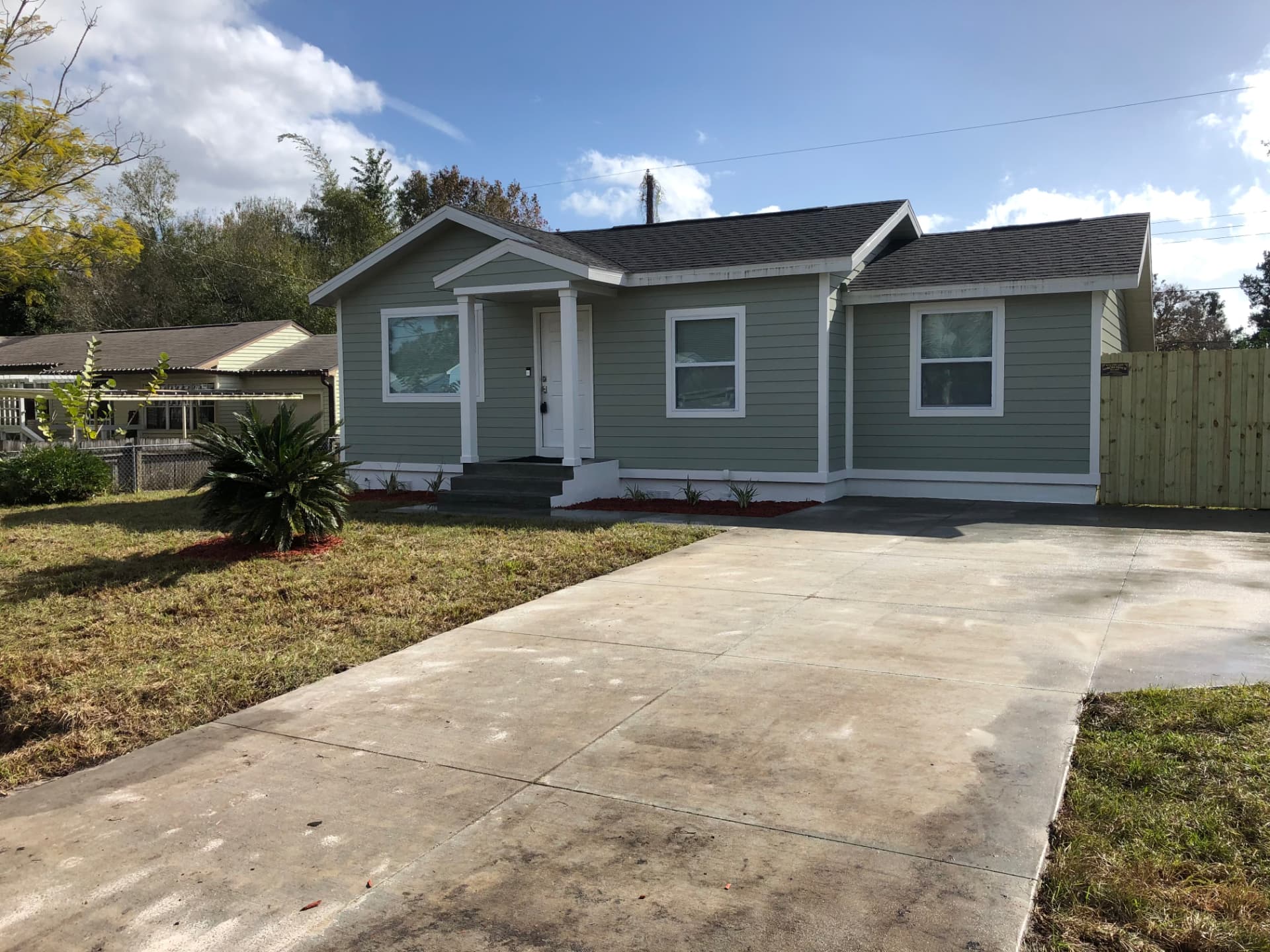 House 1 — front exterior after